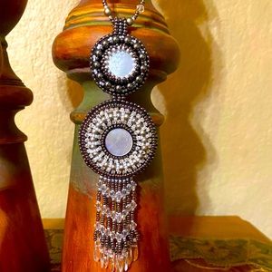 Double component with fringe on beaded chain